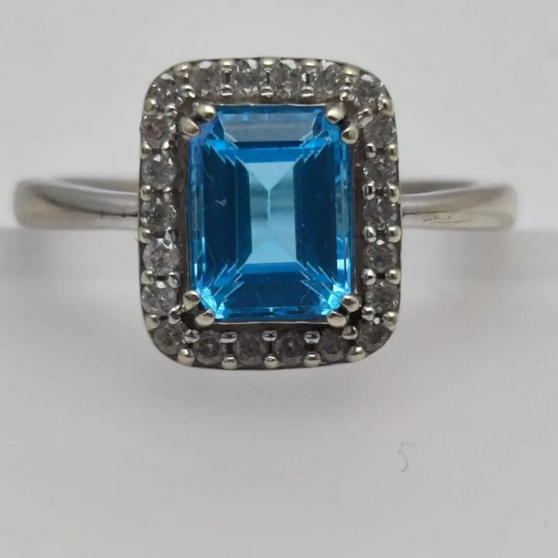 9ct White Gold Ring Blue Topaz and 0.25ct Diamonds Ring Size O
